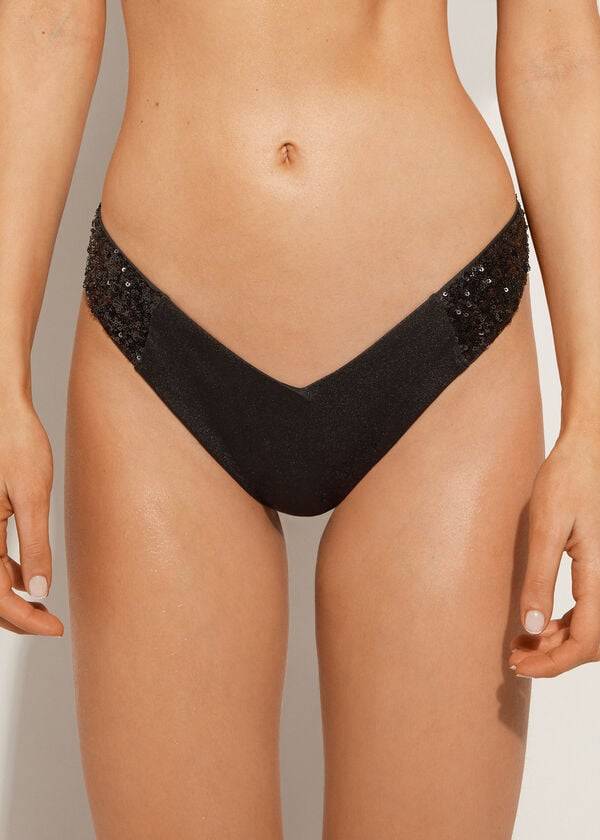 damen-bikinihose calzedonia mit pailletten hohem beinausschnitt brasilianischem cannes-schnitt frech schwarz