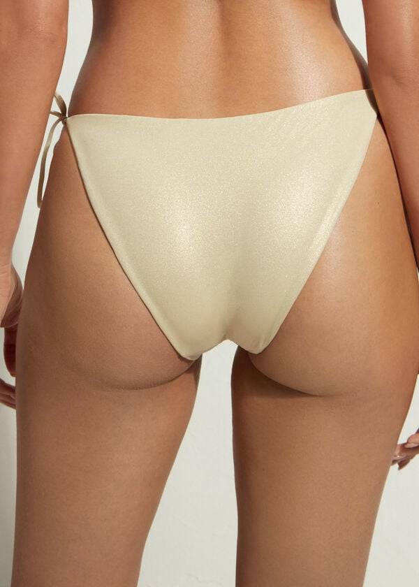 goldfarbene calzedonia string-bikinihose für damen aus abu dhabi